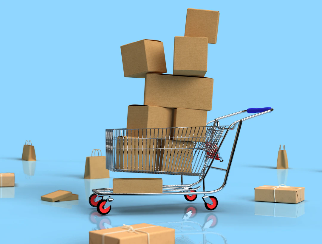 Small shopping cart carrying cardboard parcels against a blue background