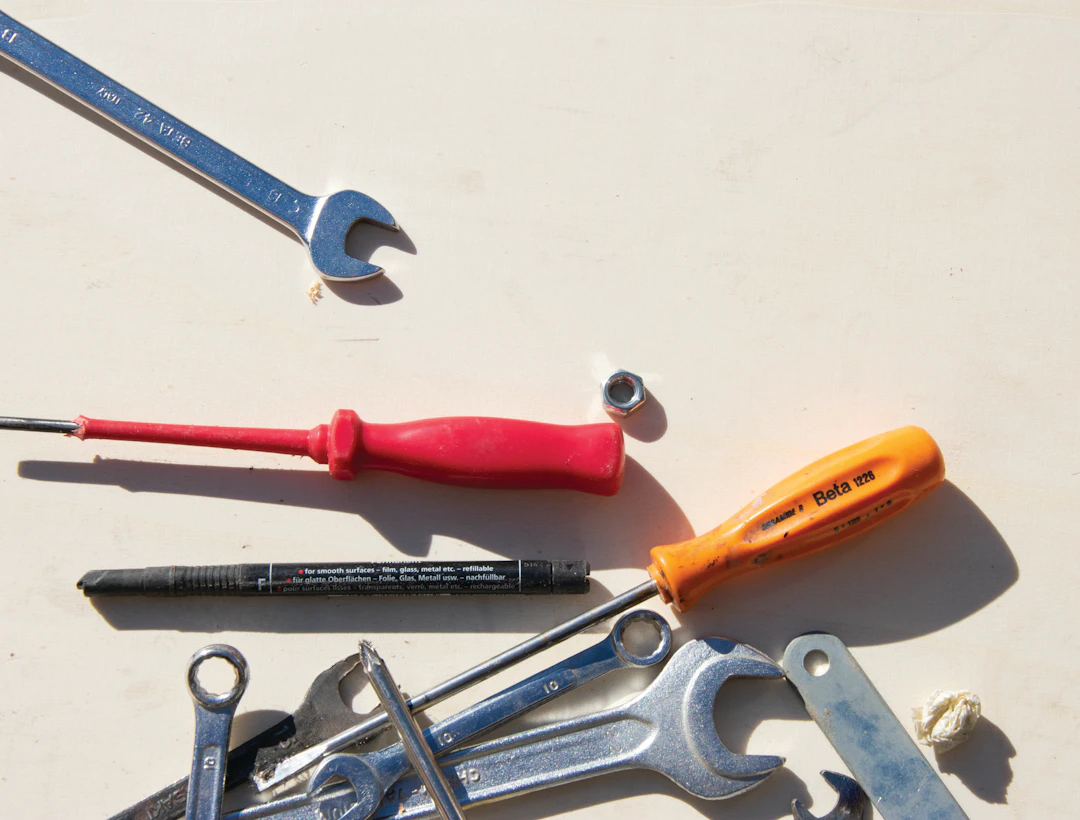 Hand tools arranged on a work surface